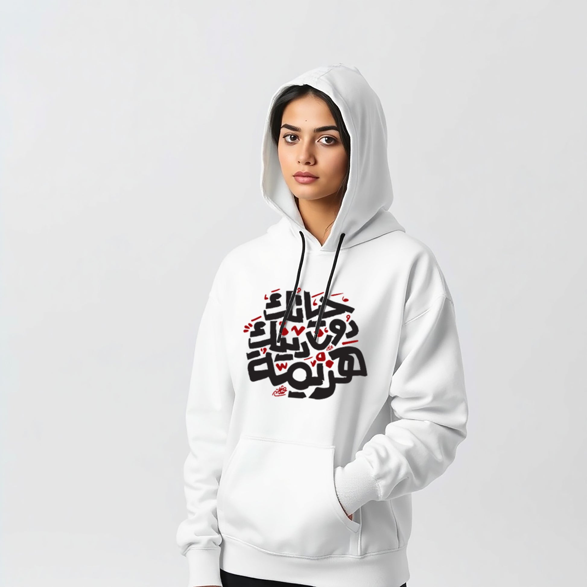 White graphic hoodie with Arabic calligraphy design, worn by a model. Premium quality fabric with a stylish fit, perfect for trendy streetwear.